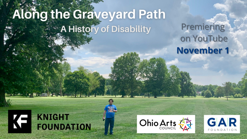 Schneider Park in Akron, OH. Actor stands in park near former Pauper's Burial ground.